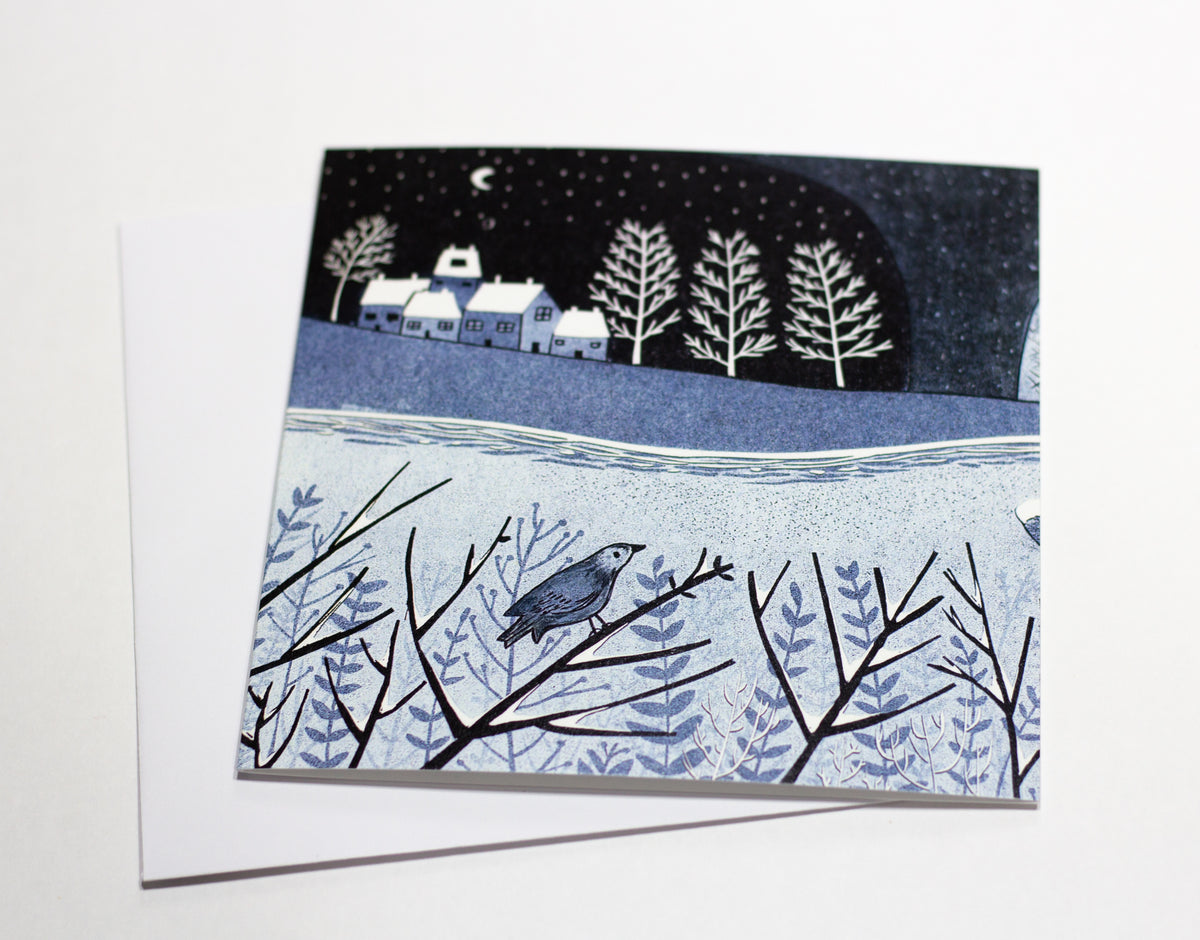 Wild Winter Christmas greeting card displayed with envelope