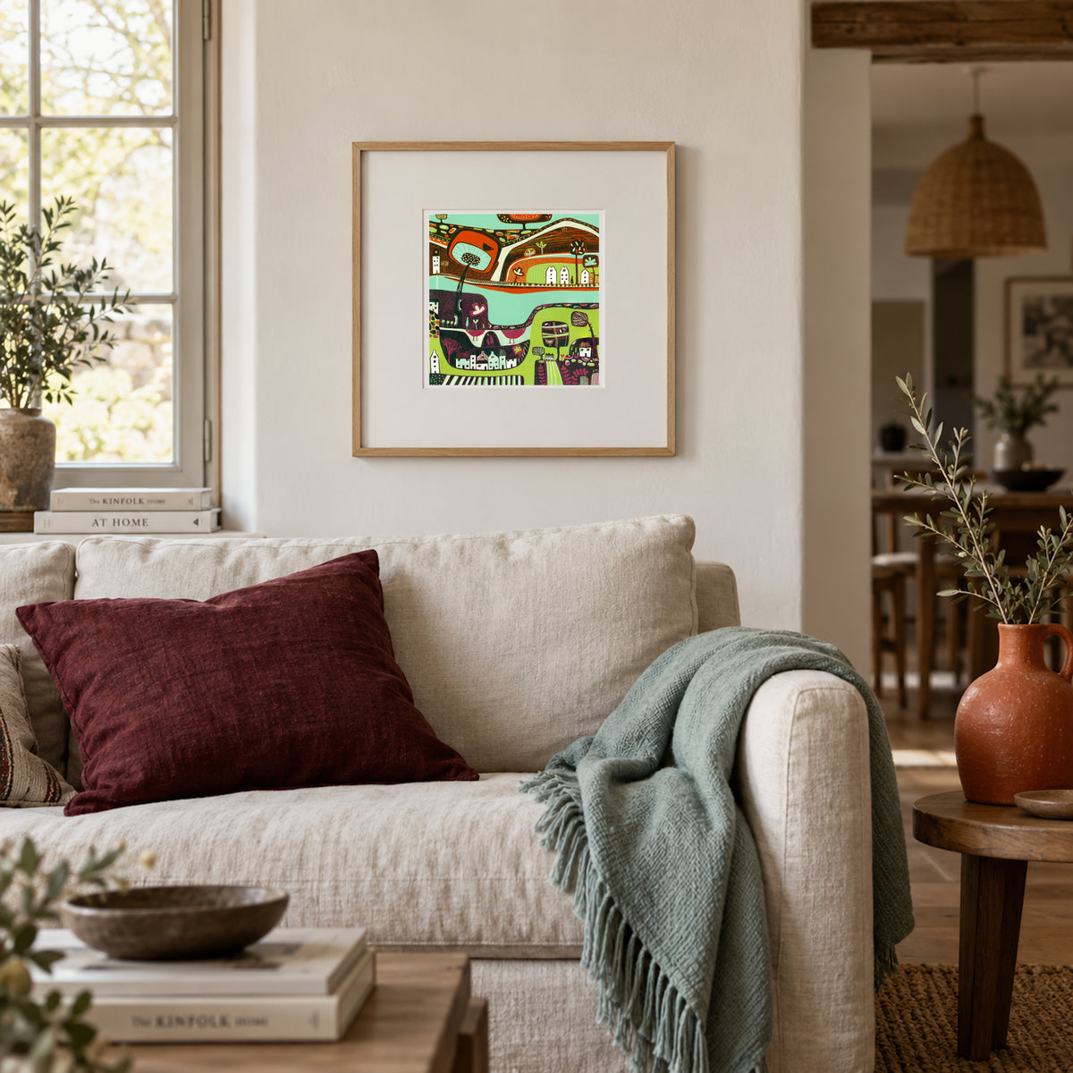 A Handful of Memories framed landscape linocut print displayed in a contemporary living room