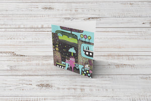 Beautiful birthday greeting card with a colourful landscape linocut print.