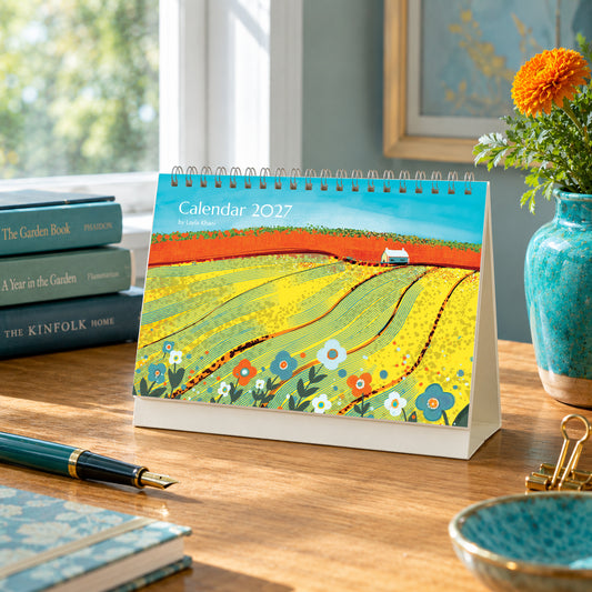 2027 art desk calendar cover featuring colourful countryside painting by Layla Khani