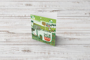 Artistic 'just because' card with a captivating linocut landscape.