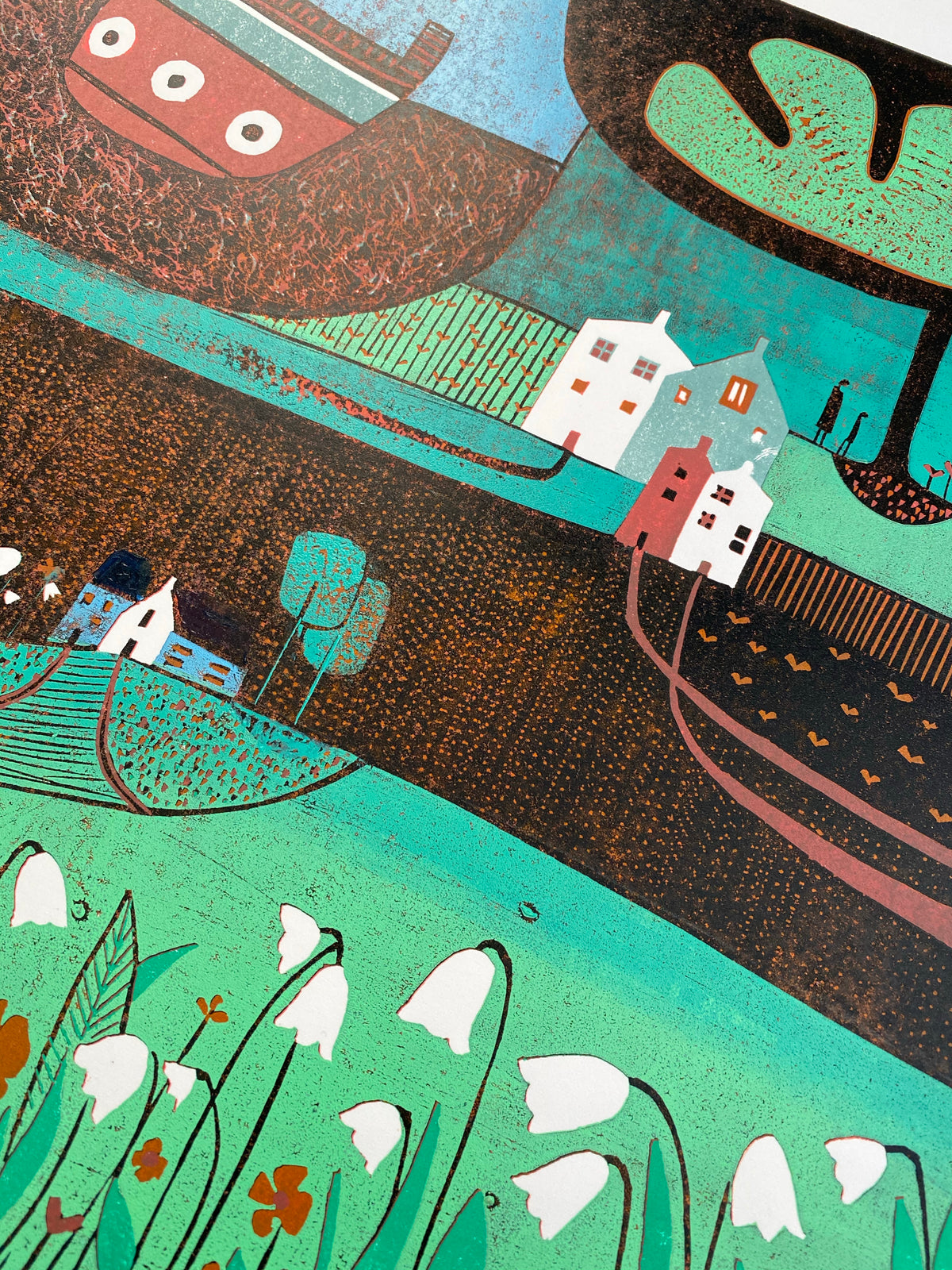 Detail of houses, fields and hand-printed textures in Autumn Days linocut print