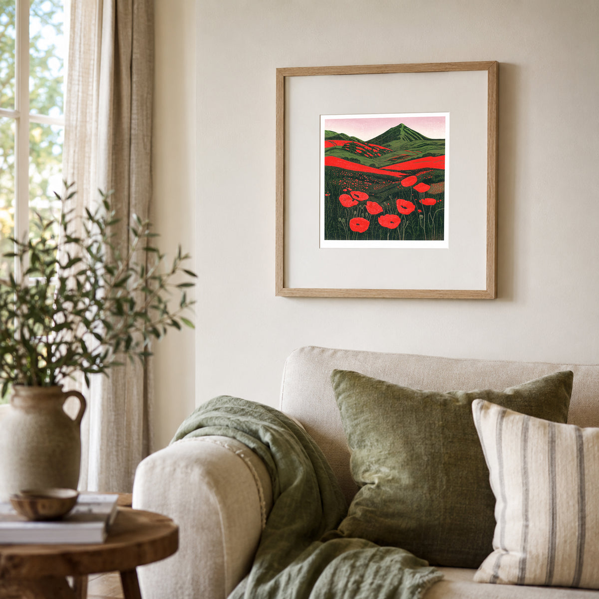 Hillside Poppies in Bloom original landscape linocut print framed on a wall