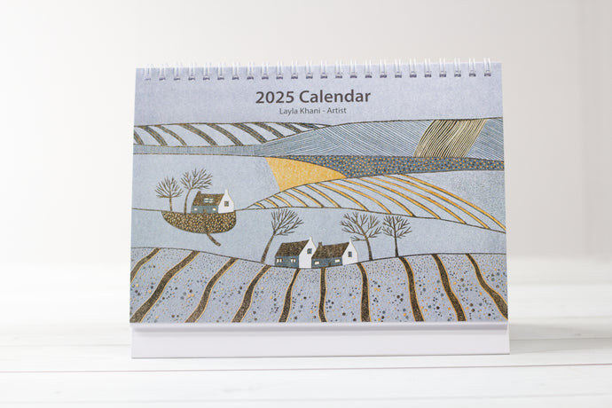 Front cover of the 2025 standing desk calendar featuring a vibrant linocut print by Layla Khani from Laylart Studio.