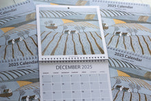 Load image into Gallery viewer, December 2025 page with a festive linocut print by Layla Khani, part of a 2025 large square wall calendar.