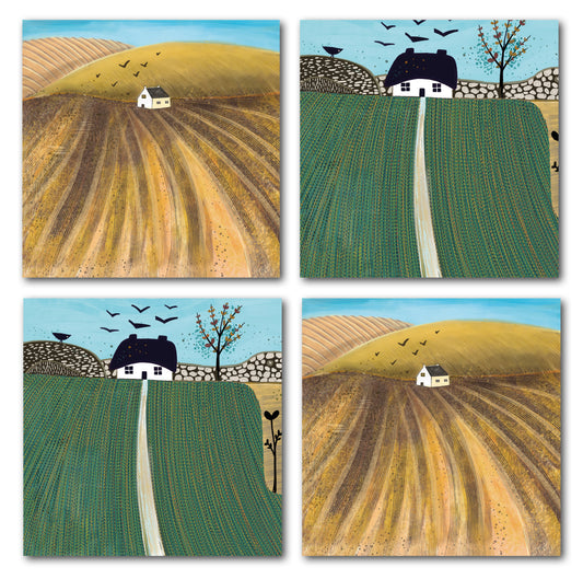 Set of four autumn landscape greeting cards featuring two countryside designs with cottages, harvested fields, birds and warm ochre, green and blue tones.