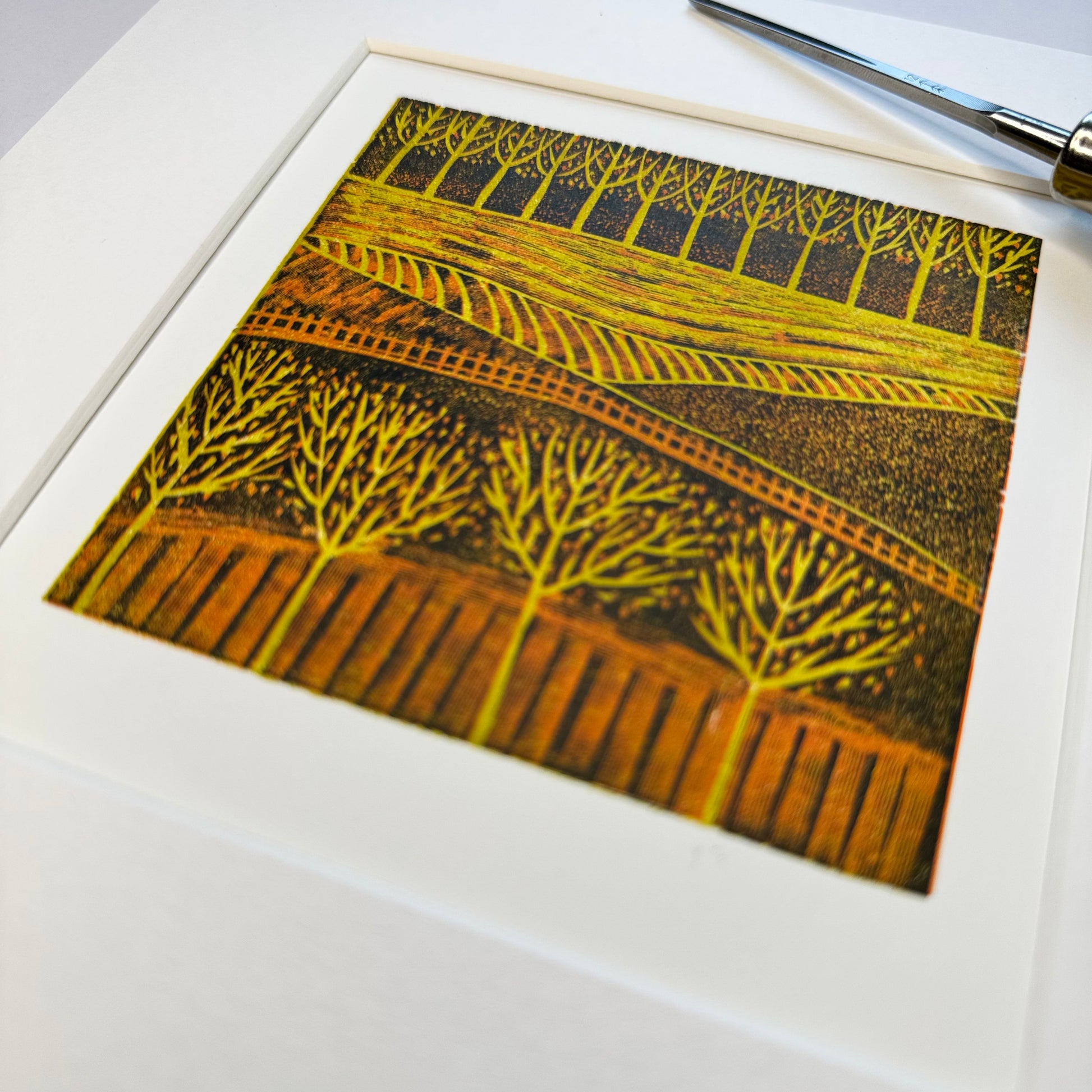 Autumnal Fields mini linocut print shown flat, hand-carved by Layla Khani, Laylart Studio