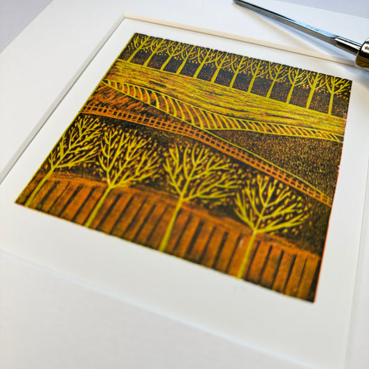 Autumnal Fields mini linocut print shown flat, hand-carved by Layla Khani, Laylart Studio