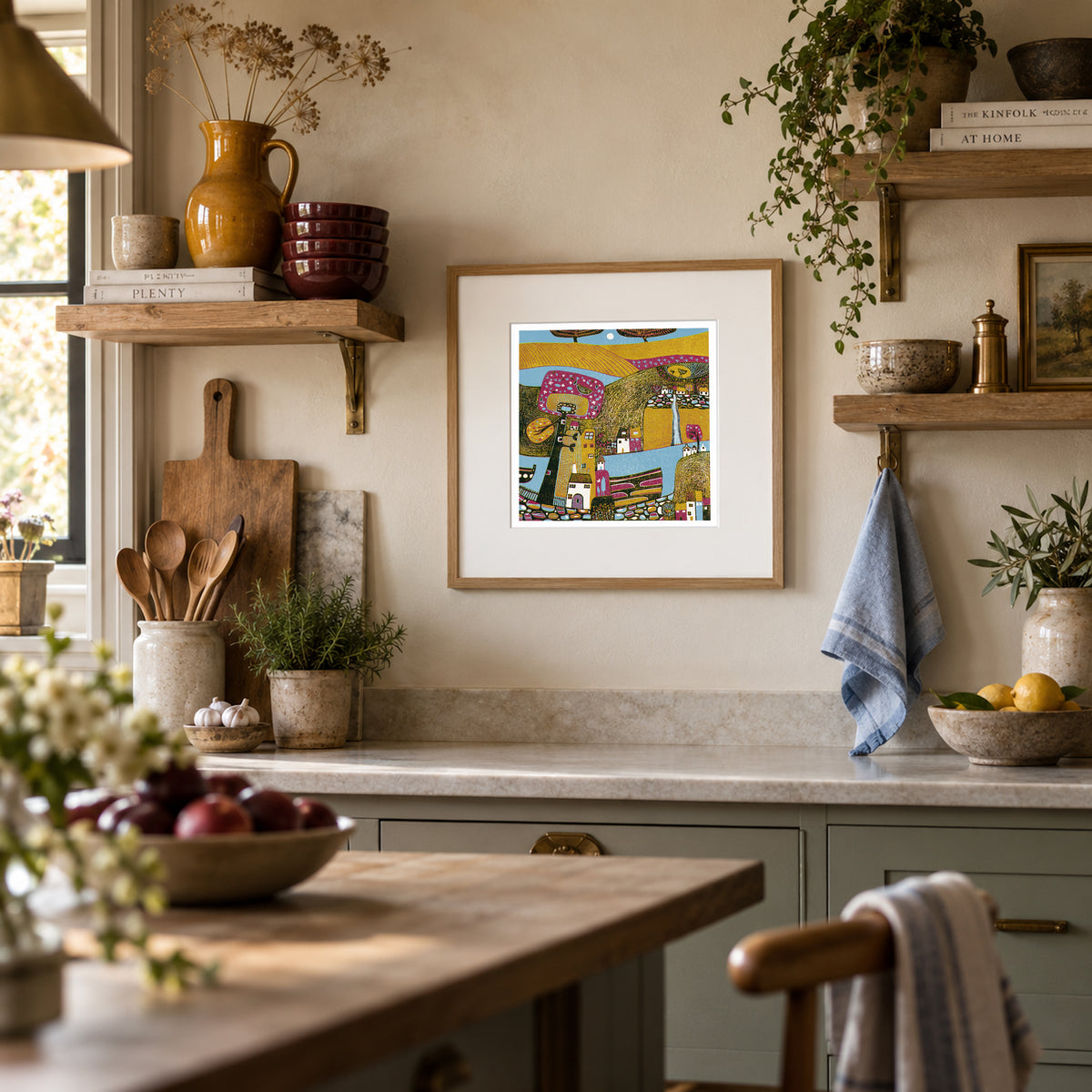 Over the Mountains framed landscape linocut print displayed in a bright kitchen interior