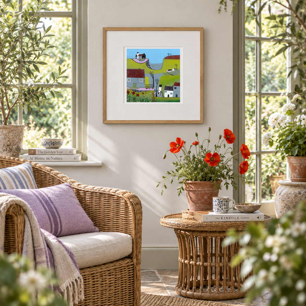 The Hills Above the Shore framed original linocut print displayed in a bright living room