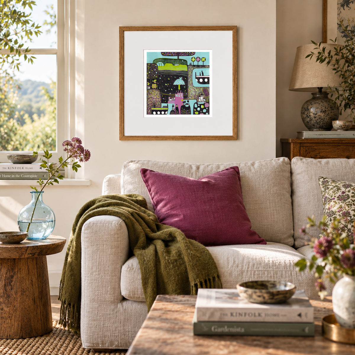 A Gust of Wind framed original linocut print displayed in a warm contemporary living room