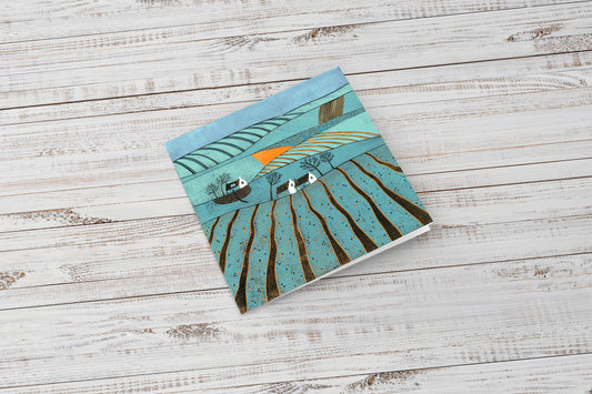 Fields of Tranquility linocut greeting cards flat lay, pack of 4 by Laylart Studio