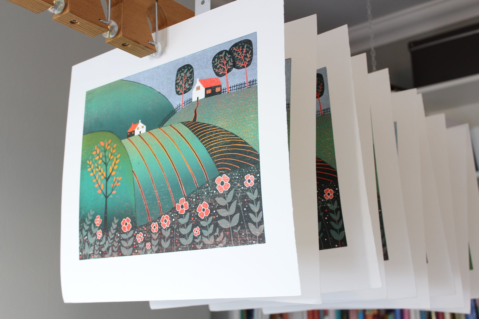 The Path Home limited edition linocut prints drying in the studio, hand-printed by Layla Khani