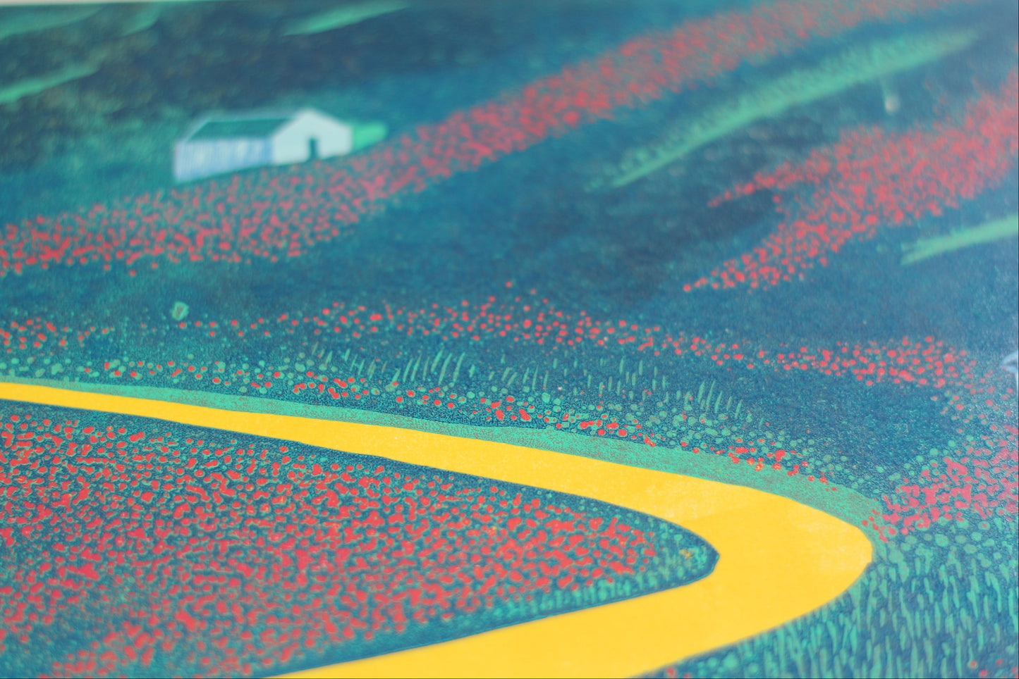 Close-up of A Path Through Summer reduction linocut showing hand-printed wildflowers, carved texture and layered colour