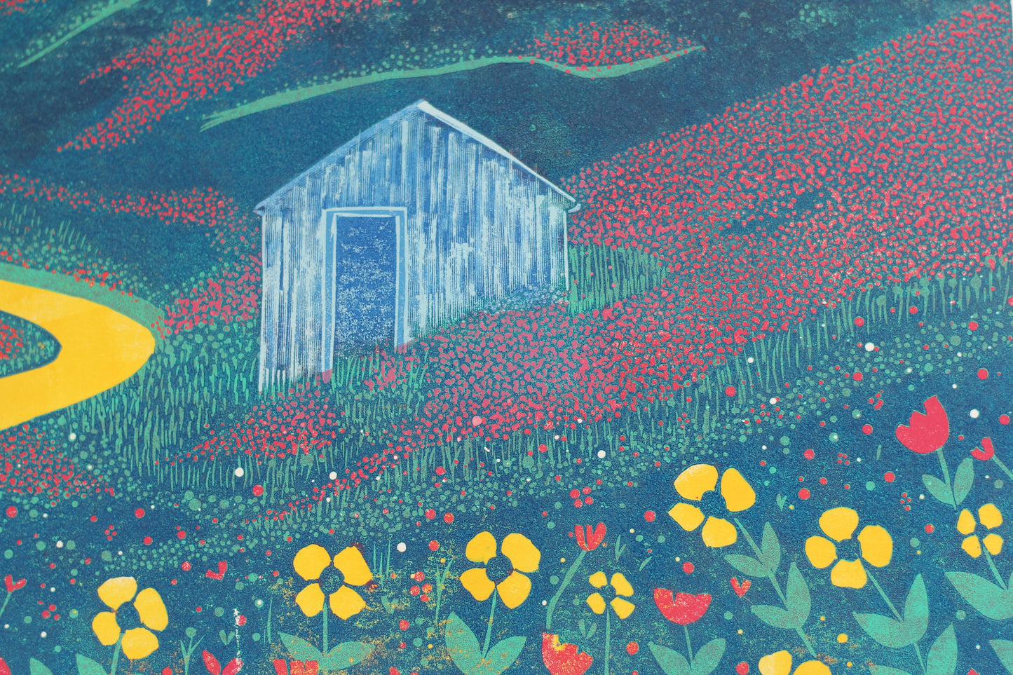 Close-up of A Path Through Summer reduction linocut showing hand-printed wildflowers, carved texture and layered colour