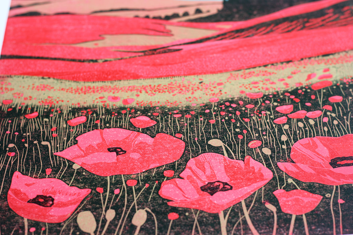 Detail of hand-printed colours and carved marks in Poppy Fields reduction linocut