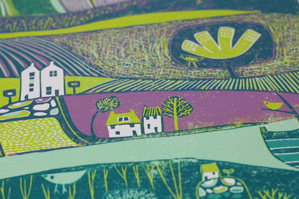 Close-up of carved field patterns, houses and trees in Green Valley linocut print