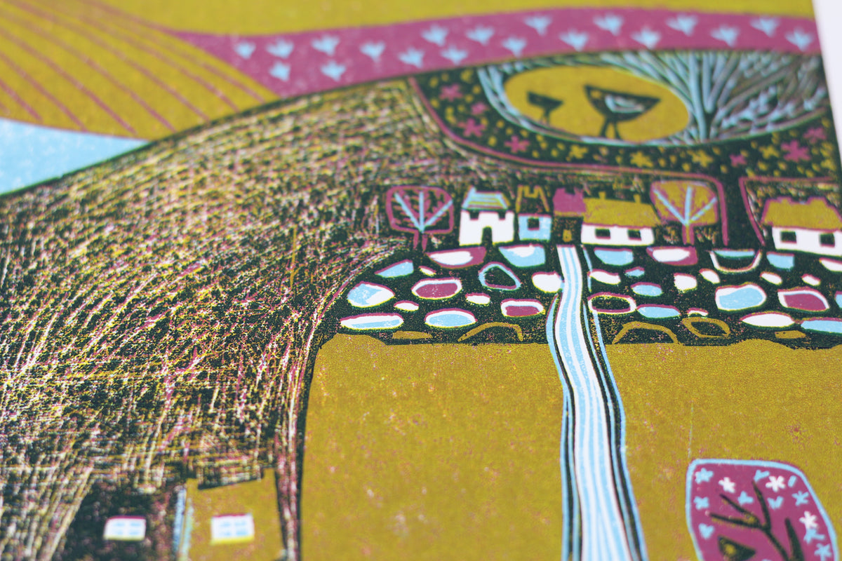 Close-up showing intricate carved marks and landscape details in Over the Mountains linocut print