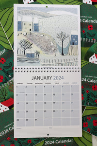 January 2024 calendar page with a serene wintry scene at the top, neatly displayed dates and days at the bottom, and space for notes and priorities