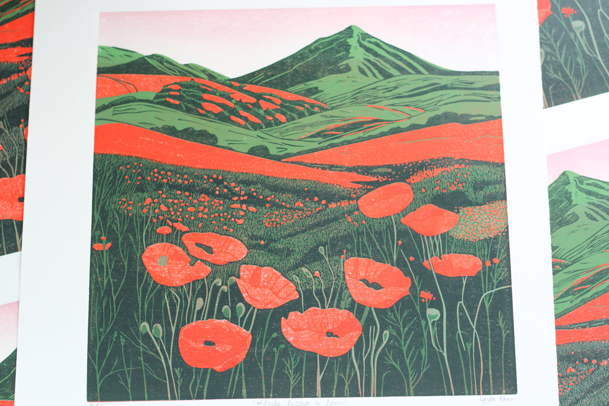 Detail of red poppies and carved textures in Hillside Poppies in Bloom linocut print
