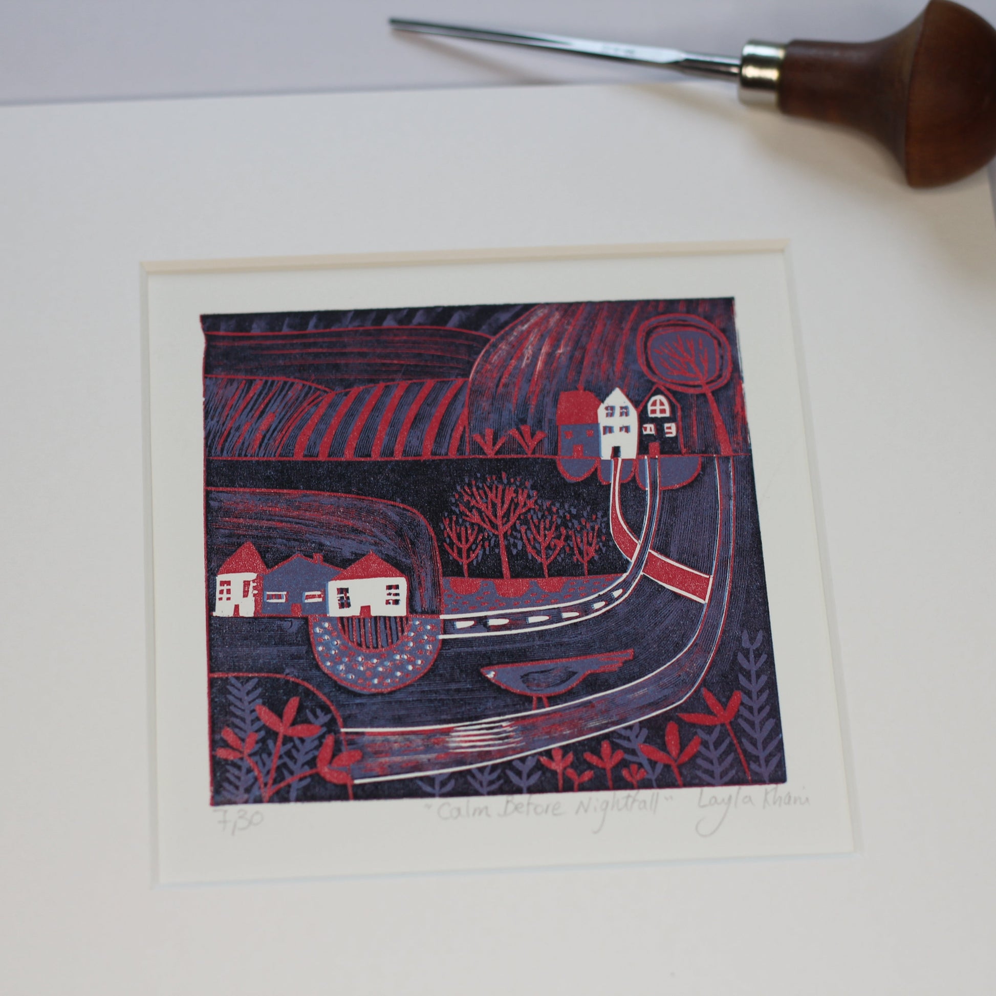 Calm Before the Nightfall mini linocut print with carving tool, hand-crafted by Layla Khani