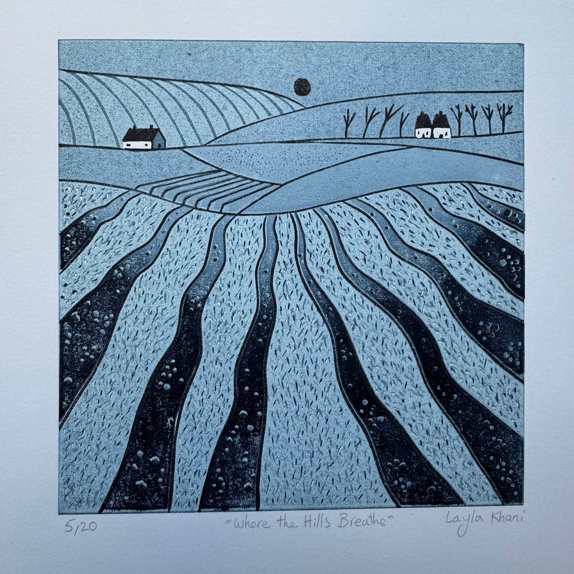 Where the Hills Breathe original hand-printed linocut showing the complete blue countryside artwork with its white paper border, title and signature.
