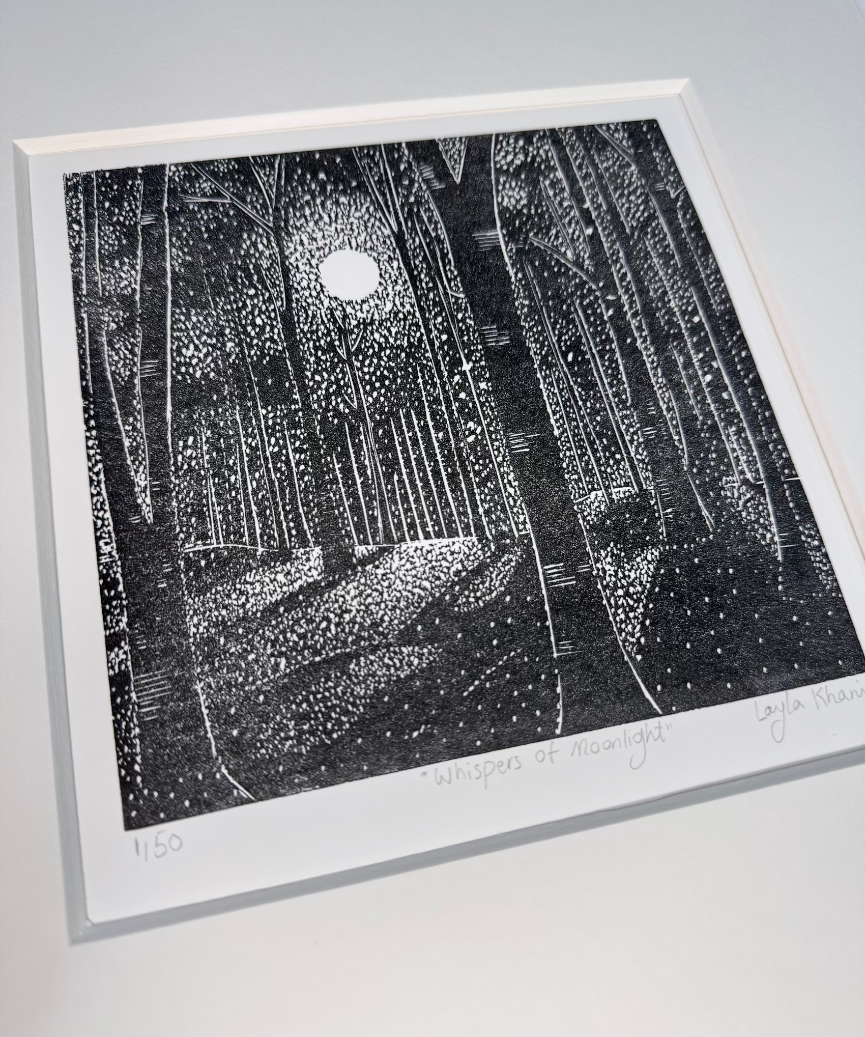 Close-up of carved trees and moonlight in Whispers of Moonlight original linocut print
