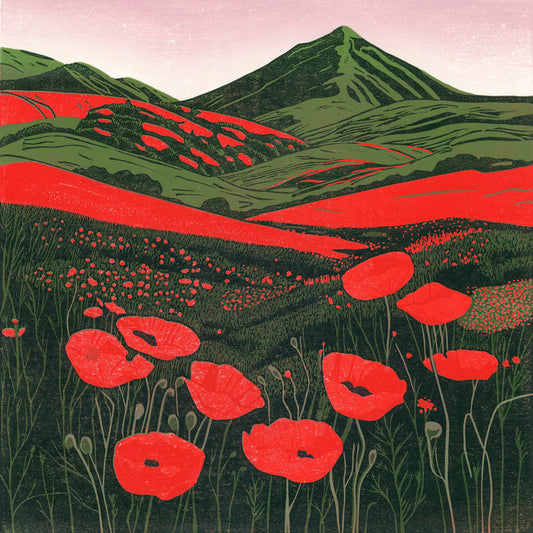 Hillside Poppies in Bloom original linocut print of red poppies across a colourful summer hillside