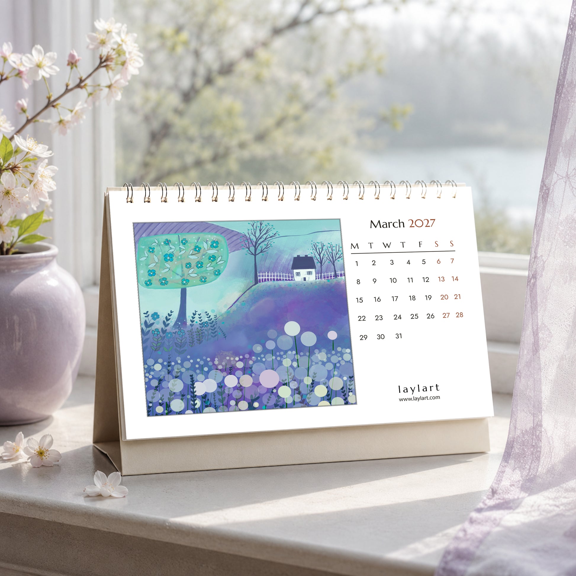2027 desk calendar open to March with blue and purple spring landscape painting