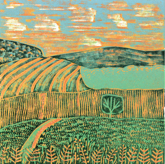 Original reduction linocut mini print by Layla Khani - sunset over the Malvern Hills fields, orange and pink sky. Hand-printed limited edition of 20.