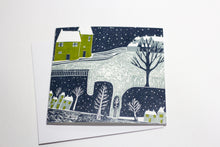 Load image into Gallery viewer, Christmas card from the Wintry Nights Collection, showcasing a detailed linocut print of a snowy winter night, with delicate details and vibrant hues.