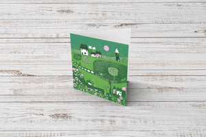 Charming new home card featuring an original, colourful linocut design.