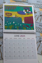 Load image into Gallery viewer, Colorful and intricate linocut print by Layla Khani, highlighting the June 2025 page in a wall calendar.