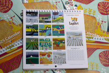 Load image into Gallery viewer, A glance at all months for this colourful linocut calendar 2025 by Laylart Studio