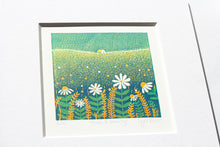 Load image into Gallery viewer, This serene linocut artwork showcases a field of wildflowers in the foreground, with gentle hills and a soft morning sun rising in the background.