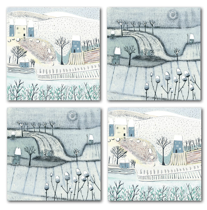 Pack of 4 Christmas cards from the Wintry Wonders Collection, featuring two elegant designs of snowy scenes in subtle shades of blue, gray, and white. Each design includes 2 cards, showcasing delicate snowing details.