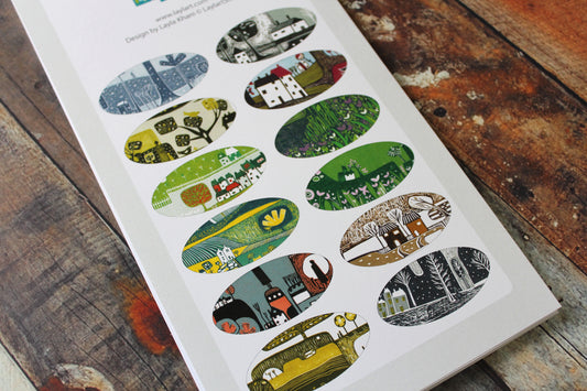 Overview of all 12 months of the Laylart linocut birthday calendar