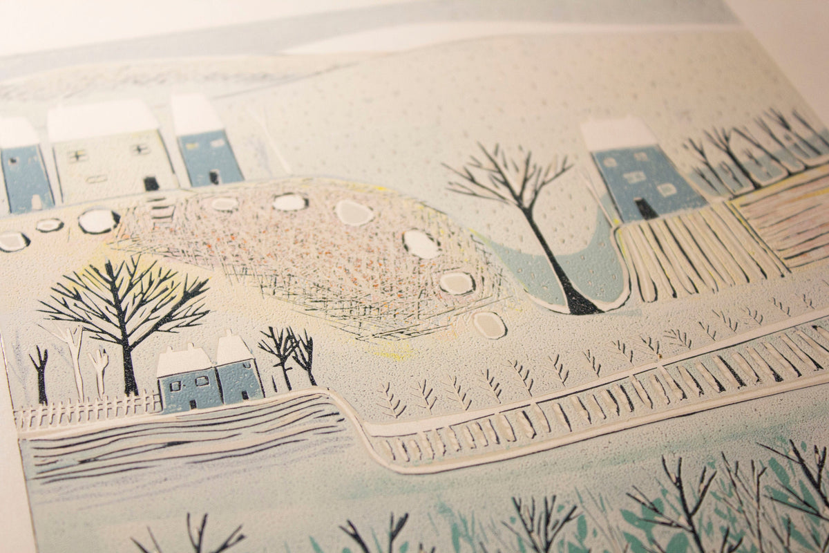 Close-up of cottages, bare trees and carved landscape details in Blue Winter linocut print